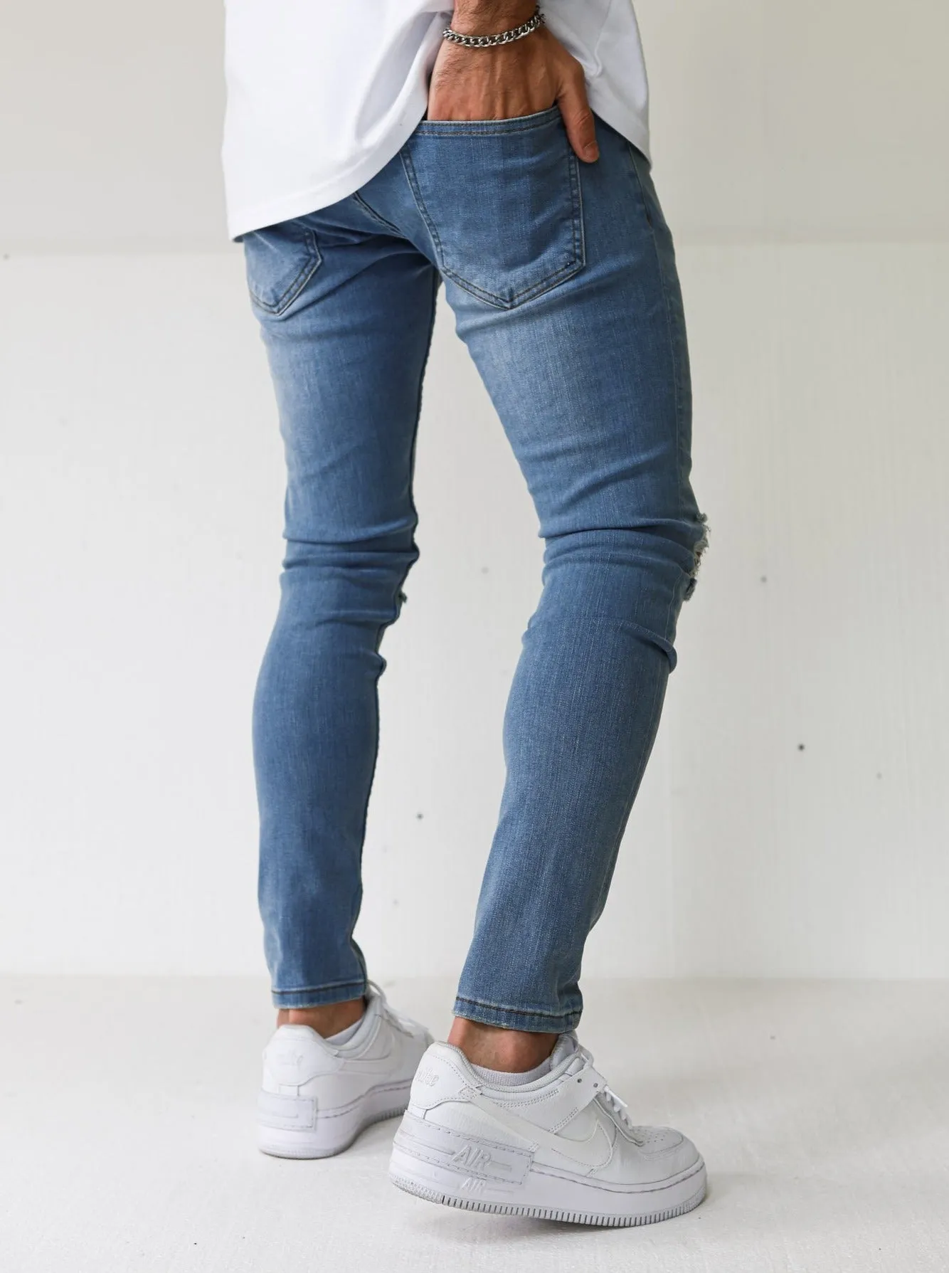 Vintage Blue Knee Ripped Jeans