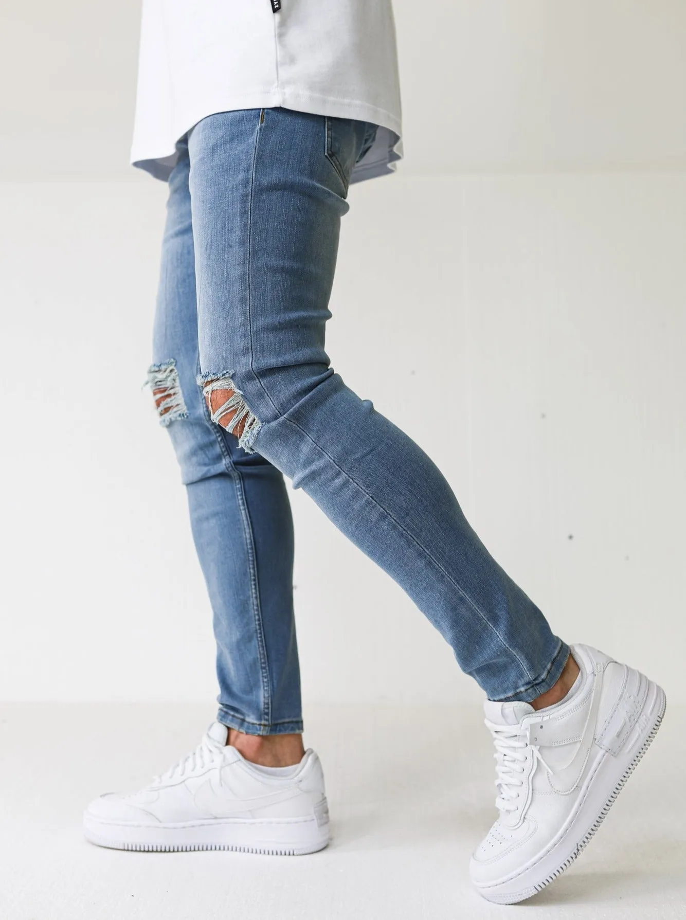 Vintage Blue Knee Ripped Jeans